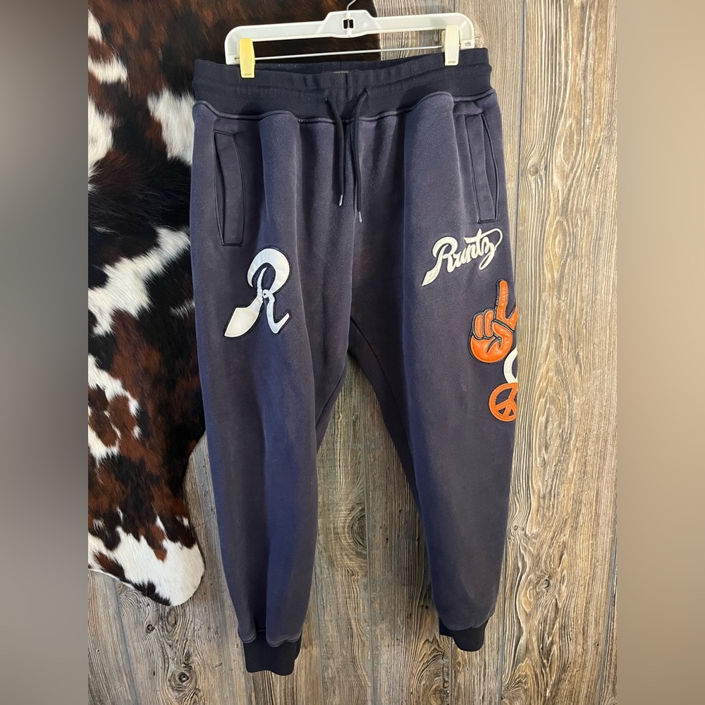 Runtz men’s size XXL navy blue with orange and white leather inlay peace graphic